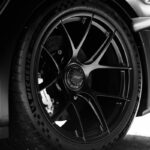 Vehicle undergoing spring tire change with summer tires installed